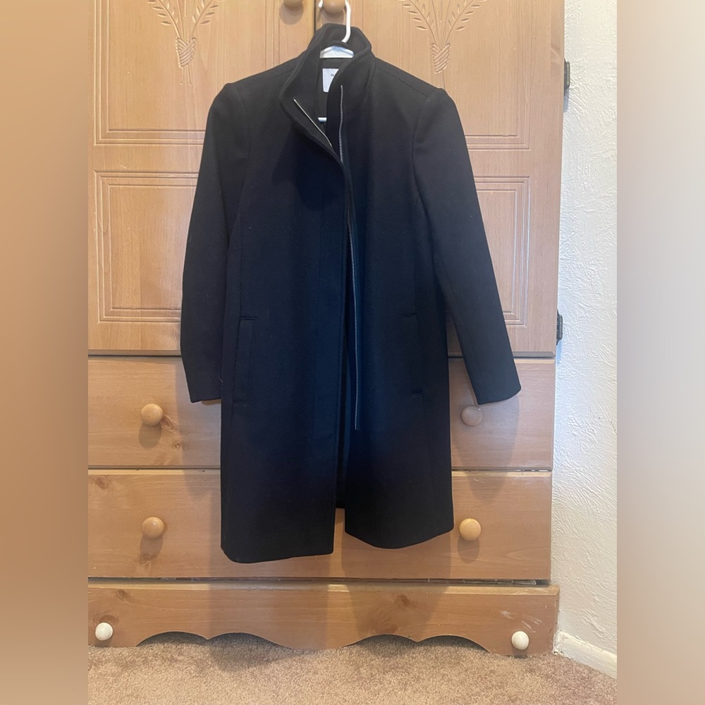 Xs petite black coat with silver zipper.